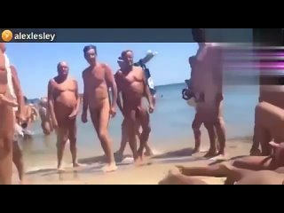 girl gets high on the beach and everyone jerks off